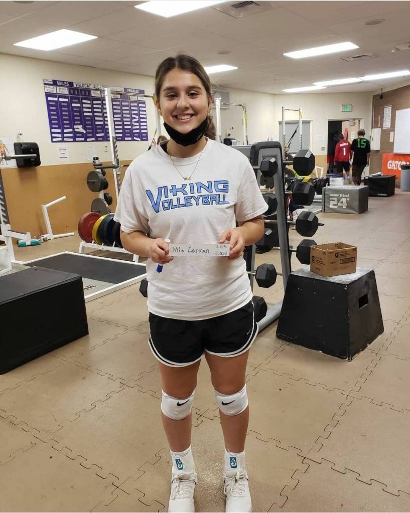 Oak Harbor High School junior Mia Carman broke a school record in the trap bar dead lift this summer while she trained for volleyball season.