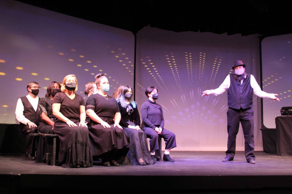 The cast rehearses Sit Down, Youre Rockin the Boat, an upbeat tune from Guys and Dolls.
