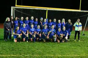 South Whidbey High Schools girls soccer team is headed to state. Front row, left to right: Sophia Geurkink, Carlie Kuschnereit, Baylie Kuschnereit, Elsa Layman, Emma Callahan, Kenzie Culver, Maya Janes-Starkweather, Ella Waldron. Back row, left to right: Assistant Coach Anne Haines, Adelina Baker, Willa Steeb, Sidney Ollis, Ashton Helseth, Ella Pozarycki, Mackenna Lane, Simone White, Elizabeth Haines, Leniece Gonzales, Nikki Murnane, Kailey Ricketts, Mikenna Wicher, Maddy Racicot, Head Coach Terry Swanson. (Photo provided)