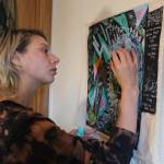 Photo by Karina Andrew/Whidbey News-Times
Nora Boehm adds the finishing touches to a commissioned textile painting to be sewn onto the back of a jacket. Boehm will be selling some of her art work at the All Hands Holiday Bazaar, put on by the Officers Spouses Club of Whidbey Island on Dec. 4 in Oak Harbor.