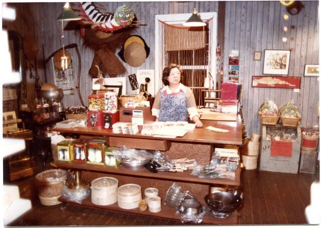 Rose Brosseau stands behind the counter at the Six Permissions restaurant.