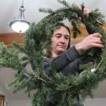 Photo by Karina Andrew/Whidbey News-Times
Mosa Neis forms a festive holiday wreath out of native plants. The Pacific Rim Institute operations manager said native plants benefit the local environment in many ways.