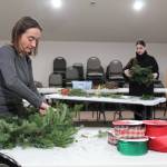 Photos by Karina Andrew/Whidbey News-Times
Mosa Neis, left, and Dawn Meredith work on native plant wreaths at the Pacific Rim Institute Dec. 6.