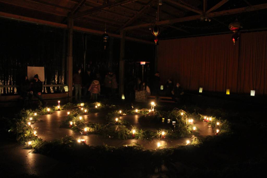 Photo by Karina Andrew/Whidbey News-Times
The winter spiral was made of evergreen tree branches and lit with candles gradually throughout the night.