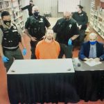 Wheeler is surrounded by corrections deputies