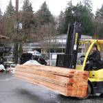 Yard attendant Brady Mullins drives a forklift to load 2x6 boards at Frontier Building Supply in Freeland.  With high demand and diminished supply, lumber costs nearly twice as much now as two months ago.