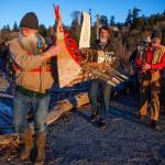 Photo by David Welton
Michael Clyburn, left, and Ryan Kerkvliet carried the Viking boat to the waters edge at Maxwelton Beach on Saturday.