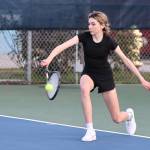 Photo by John Fisken
South Whidbey junior Abby Amundson, No. 1 singles in varsity, returns the ball during a match against Oak Harbor March 16.