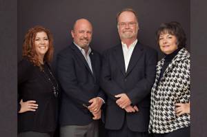 The insurance experts at Craven Insurance, from right to left: Kathy Craven, Bob Craven Scott Smith and Elaine Hofstadter.