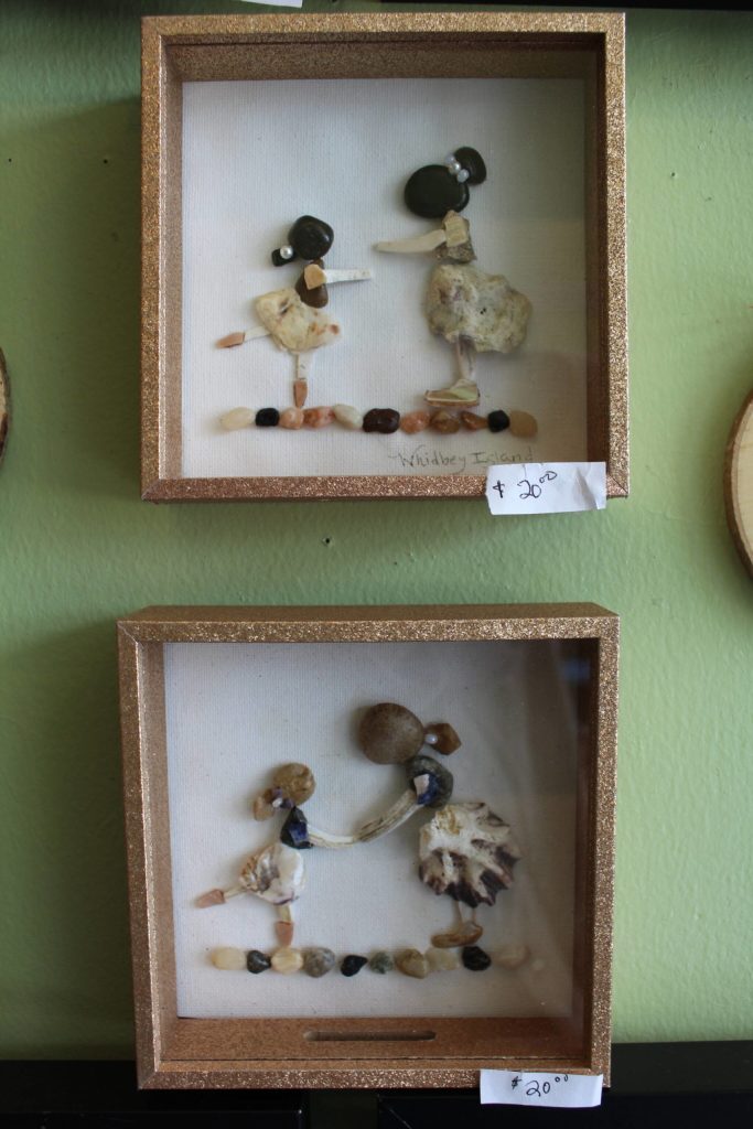 Libby Hammers unique rock art uses organic materials gathered from Whidbey Island beaches.