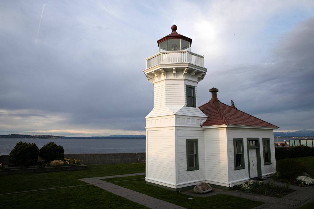 The Mukilteo lighthouse is seen at sunset Wednesday, April 13, 2022, in Mukilteo, Washington. (Ryan Berry / The Herald)