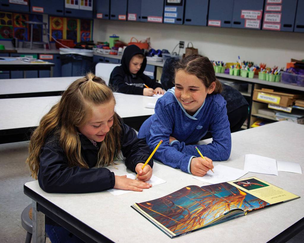 Photo by David Welton
Ashlyn Haines, left, and Ramona Gunn work on sketches during art class.