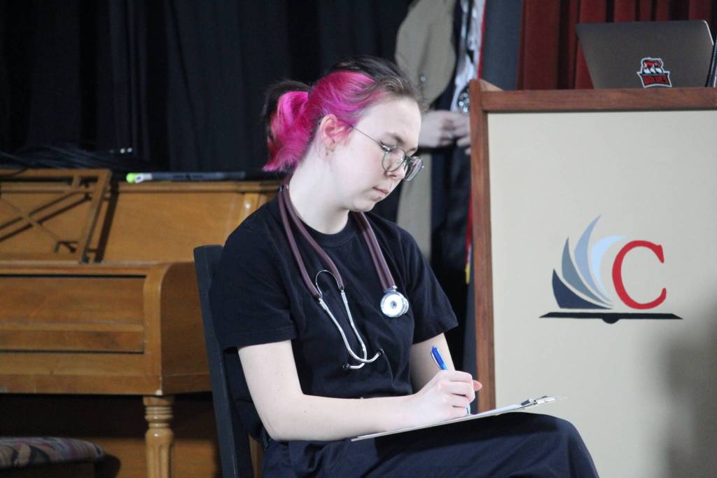 Adrian Burrows plays several roles in Coupeville High Schools production of Trap.