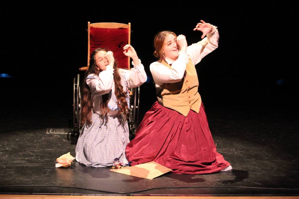 Megan Croft, left, and Gabby Eaton practice Some Things are Meant to Be from Little Women. (Photo by Karina Andrew/Whidbey News-Times)