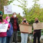 Whidbey residents took to the street Tuesday in Coupeville to rally for abortion rights following the leak of a Supreme Court draft opinion that indicated the court intends to overturn Roe v. Wade. (Photo by Karina Andrew/Whidbey News-Times)