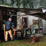 Crazy weather didnt prevent Hearts Hammers volunteers from working to help a neighbor. (Photo by David Welton)
