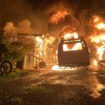 A residential fire engulfs a North Whidbey home, two vans and a boat early Thursday morning. (Photo by North Whidbey Fire and Rescue)