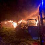 A residential fire engulfs a North Whidbey home, two vans and a boat early Thursday morning. (Photo by North Whidbey Fire and Rescue)