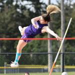 Photo by John Fisken
Sophomore Natalie Chadduck competes in the pole vault event. She won first place with a height of eight feet.