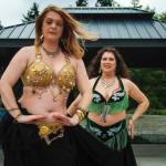 Souzana Van Horn, left, and Theresa Chandani Ortega dance together at Hierophant Meadery. (Photo by David Welton)
