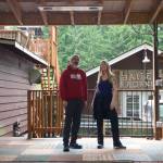 Ken Stange, owner of Baileys corner, and Lauren Flynn, local musician, on Baileys outdoor stage. (Photo by Rachel Rosen/Whidbey News-Times)