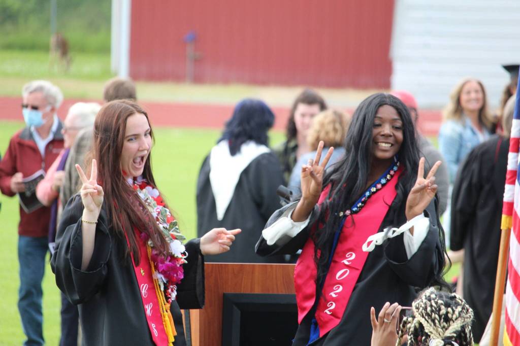 Photo by Karina Andrew/Whidbey News-Times
Graduates Isabelle Wells, left, and JaKenya Hoskins pose for a photo in the aftermath of the graduation ceremony.