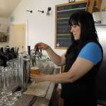 Marissa Thomas pours a pint of Rainbow Sour, which is Double Bluff Brewing Companys beer celebrating Pride Month. (Photo by Kira Erickson/South Whidbey Record)