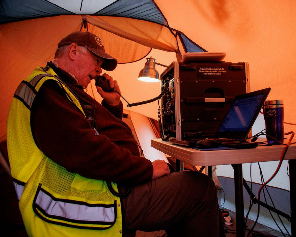 Photo By David Welton
Ham radio operator, Bob Stevens, helps out.