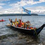 The Blue Heron Canoe arrives at Whidbey Island. (Photos by David Welton)