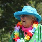 Joan Benedetti giggles along with the group during a laughter yoga session in Langley July 8.