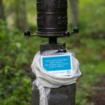 A prayer wheel is seen along the path at Earth Sanctuary. (Ryan Berry / The Herald)