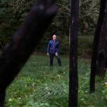 Earth Sanctuary owner Chuck Pettis next to his Ley Line piece on Tuesday, Oct. 20, 2020 in Langley, Wa. (Olivia Vanni / The Herald)