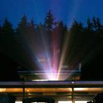 Light from the projector fills the air during a viewing of Minions: The Rise of Gru at the Blue Fox Drive-In Theater. (Ryan Berry / The Herald)