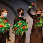 From left to right, Lily Cerda, 13, Anja Bentsen, 13, and Irene Stewart, 14, play the apple trees in The Wizard of Oz.
