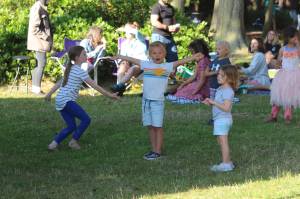 Photo by Karina Andrew/Whidbey News-Times
Children dance to the live music at the Deception Pass 100th anniversary community picnic.