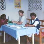Photo provided
Christine Herbert, center, works in a pre-natal clinic in Zambia while volunteering for the Peace Corps.