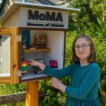 Photo by David Welton
Greta Kohlhaas, 10, places her work of art within the Langley Museum of Mini-Art.