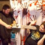Photo by Rachel Rosen/Whidbey News-Times
Jacob Boyes and his aunt Priscilla Croft fool around with the props at the Roller Barns haunted house.