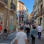 Harry Anderson photo
People walk a crowded, narrow street in Pamplona, Spain.