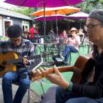 Photo by Rachel Rosen/Whidbey News-Times
Alex Lew, at left, and Jim Char of Pearl Django play in a jam session in Langley, a DjangoFest tradition.