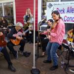 By David Welton
The streets of Langley, as well as the Freeland Library, were filled with music for five days as DjangoFest Northwest arrived. Along with the headlining bands, improvisational sessions sprang to life all over the Village by the Sea. Above, the all-female band Café Impromptu invites audience members to join in making music in front Double Bluff Brewery .