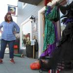 Photo by Karina Andrew/Whidbey News-Times
Mel Rodman sets up a Hocus Pocus themed display outside her business, Crows Roost. She is one of more than twenty business owners participating in this years Scarecrow Trail, part of the annual Haunting of Coupeville.