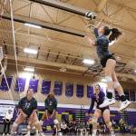 Photo by John Fisken
Sophomore Karen Salinger hits the ball in a match against Ferndale. From left, her teammates, senior Paige Fortin, sophomore Jiana Alcaraz-Carter, and senior Mia Carman support the play.