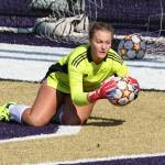 Photo by John Fisken
Freshman Estelle Thorson, goalie for South Whidbey, blocks a goal.