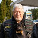 Dwayne Goner Fletcher always carries his dog Gizmo in a specialty-made pouch in his jacket. Gizmo also has a tiny helmet and sunglasses.