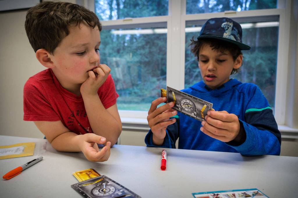 Photo by David Welton
Miles Guggenheim, 9, right, attempts a trick while Dylan Gluckman-Oskin, 7, looks on.