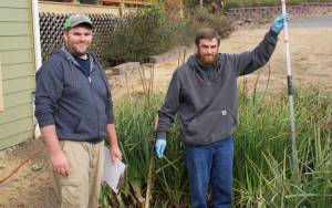 Photo by Rachel Rosen/Whidbey News-Times
Ben Miller (left) and his brother Seth (right) own Whidbey Septic. Their business involves inspecting and maintaining septic systems. Seth holds a core sampler that is used to see the contents of a septic tank.