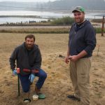 Photo by Rachel Rosen/Whidbey News-Times
Ben Miller (left) and his brother Seth (right) own Whidbey Septic. Seth is inspecting the final part of a homes septic system; the last stop before wastewater enters the groundwater.