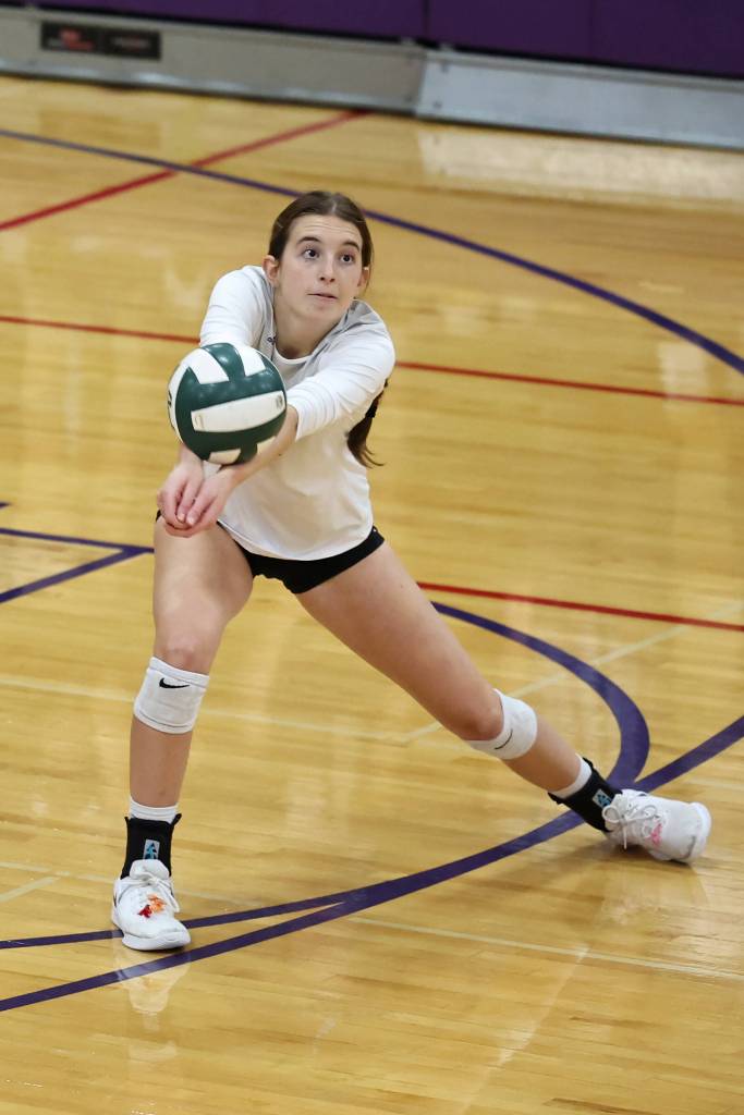 Photo by John Fisken
Oak Harbor sophomore Karen Salinger and outside hitter digs the ball at the Nov. 3 game against Edmonds. Salinger had nine digs, 13 kills and one ace for the night. The Oak Harbor varsity girls volleyball team defeated Edmonds 25-23, 25-22, 26-24 and is 6-4-1 overall this season.