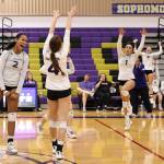 Photo by John Fisken
The Oak Harbor varsity girls volleyball team celebrates after winning a point against Edmonds on Nov. 3. (L-R) Jiana Alcaraz-Carter (sophomore, middle blocker), Karen Salinger (sophomore, outside hitter), Jasmine Phillips, (junior, right side hitter), Mia Carman (senior, libero).